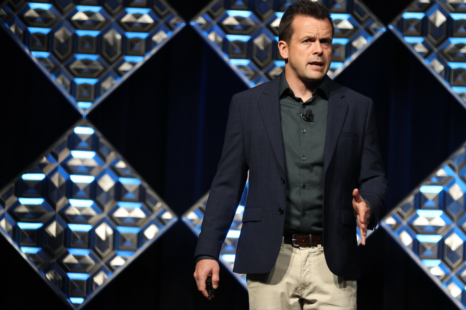 David Jenyns delivering a keynote on stage